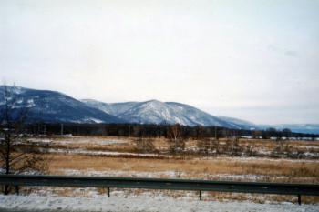 Pohled ze silnice z Mostu do Chomutova (© Prudký Martin, 03/1999)