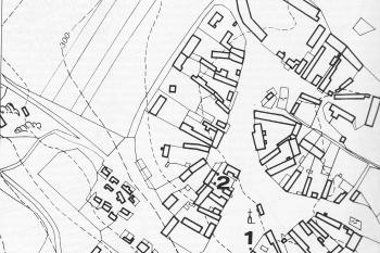 Mapka jádra vsi s vyznačením polohy původního kostela v poloze ,, a ,, (© Jan Klápště: Paměť krajiny středověkého Mostecka)